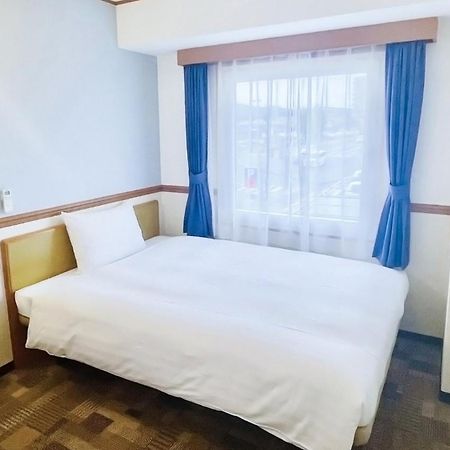 Toyoko Inn Higashi Hiroshima Ekimae Exterior photo